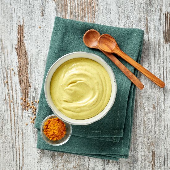 Bild von Currysauce 2 kg Becher mit der Beschreibung Edle Gewürzkompostion aus feiner Mayo & Curry.Lecker als Dip zu Kartoffelspezialitäten &  Salaten.