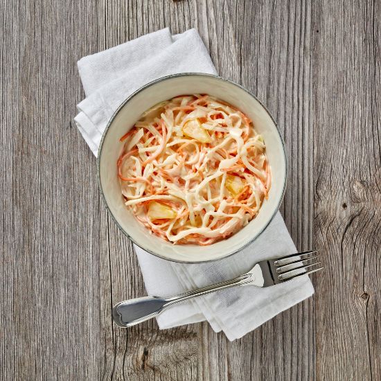 Bild von Farmersalat mit der Beschreibung Weißkohl, saftige Karotten, würziger Sellerie, exotische Ananas und eine feine Gewürzsauce