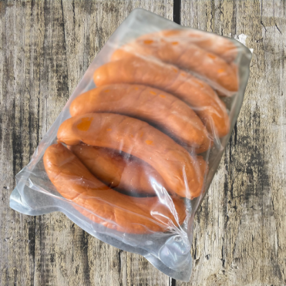 Bild von FRISCHE Bockwurst 100g/St mit der Beschreibung Knackig im Biss & goldgelb geräuchert. Im Atmospack verpackt.