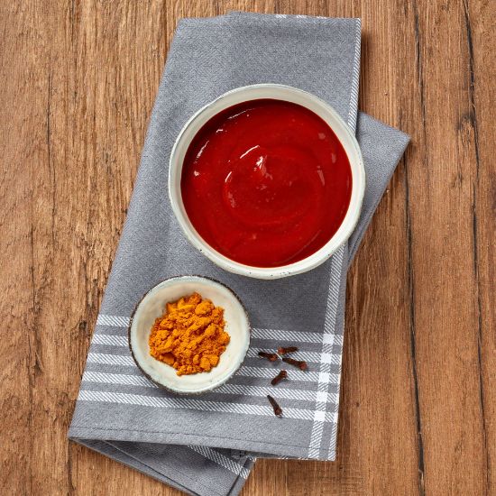 Bild von Tomatenketchup 800 ml Flasche mit der Beschreibung Aus dem Mark sonnengereifter Tomaten & feiner Würzmischung abgestimmt.In praktischer Quetschflasche