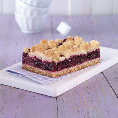 Bild von Kirsch-Streuselkuchen mit der Beschreibung 2800g, vorgeschnitten in 21 Stk. vegan