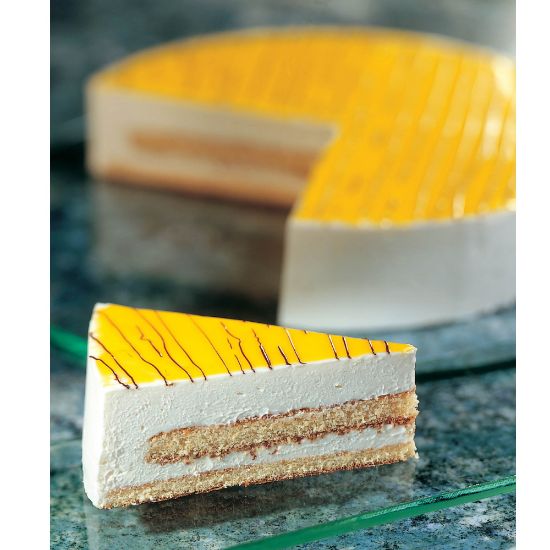 Bild von Mousse Limone Ø24cm mit der Beschreibung Zitronenmousse-Torte, ungeschnitten