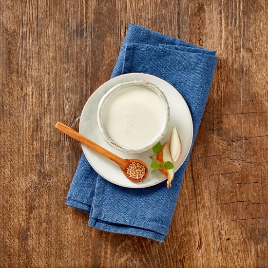 Bild von Feines Dressing "Sylter Art" mit der Beschreibung Köstlicher Joghurt und cremige Mayonnaise und aromatische Zwiebeln
