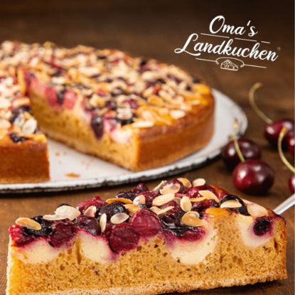 Bild von Oma´s Landkuchen Kirsch-Mandel mit der Beschreibung Ø38 cm / 3.300g / geviertelt