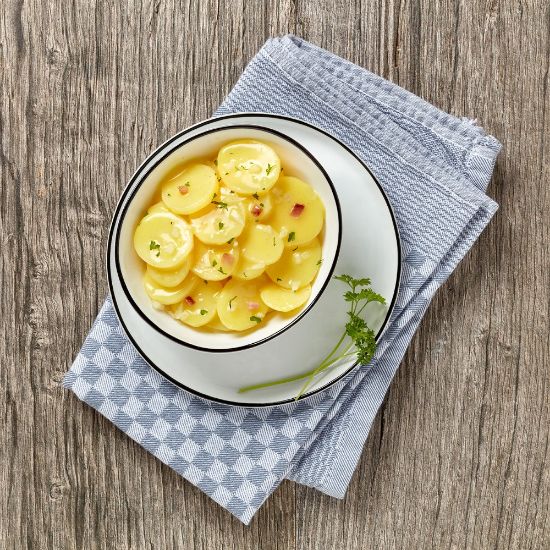 Bild von Speckkartoffelsalat mit Eigelb mit der Beschreibung Vorbestellung bis mittwochs - Lieferung ab Folgewoche Montag